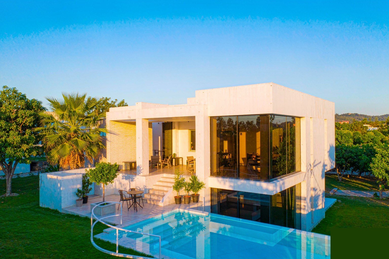 Luxury modern villa with infinity pool and floor-to-ceiling glazing